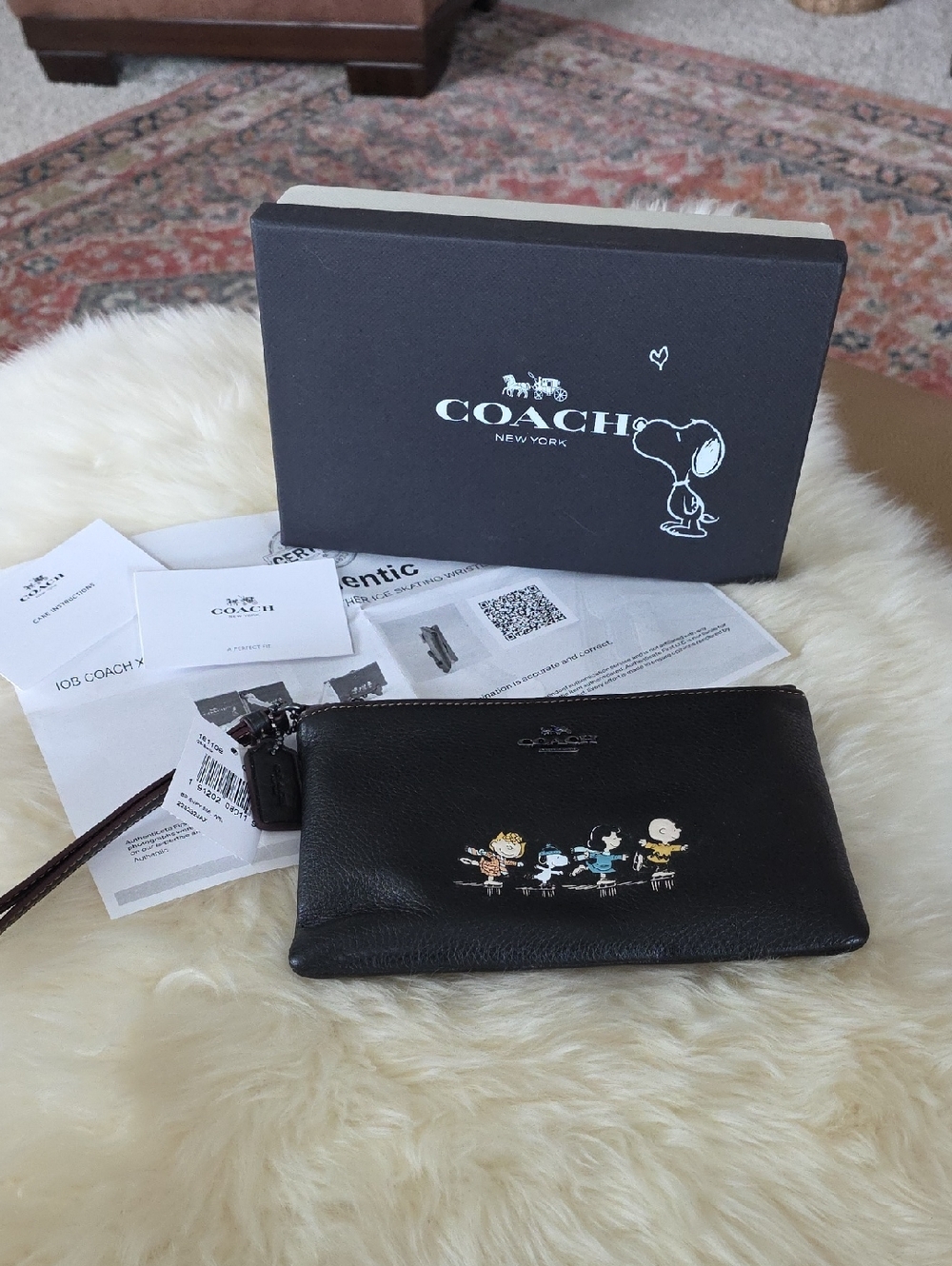NWT IOB Coach Limited Edition Ice Skating Snoopy & Peanuts Wristlet Wallet🖤🐾❤️